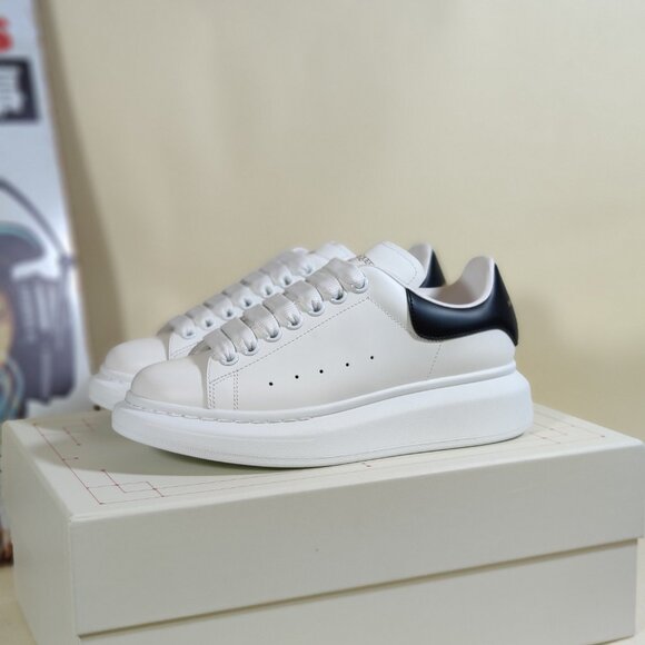 Alexander McQueen Sneaker Black New Digz Consignment Alexander McQueen Black and White Leather Sneakers
